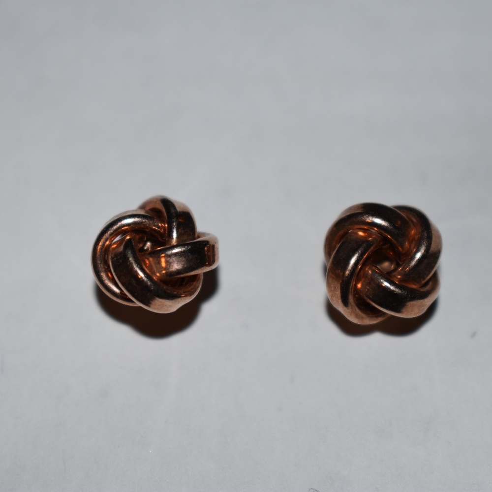 Rose gold knot design stud earrings